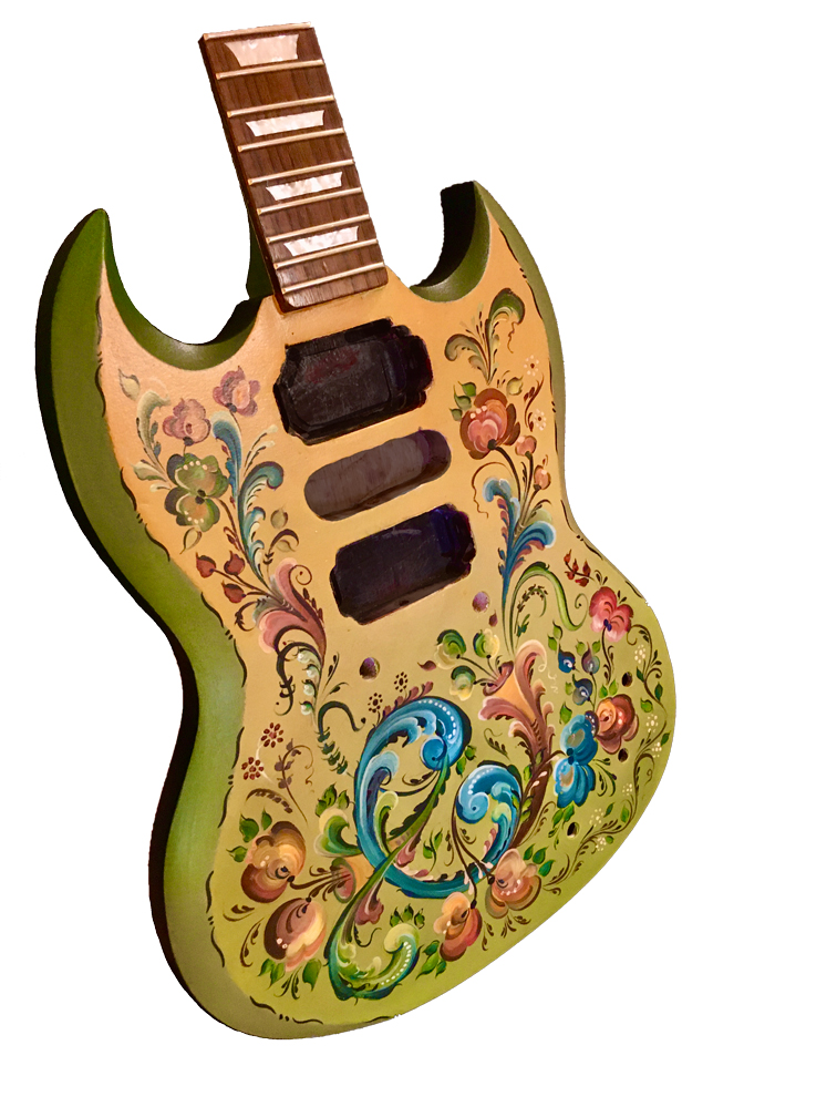Rosemaling on a guitar. Traditional style, green, blue and burgundy on oker