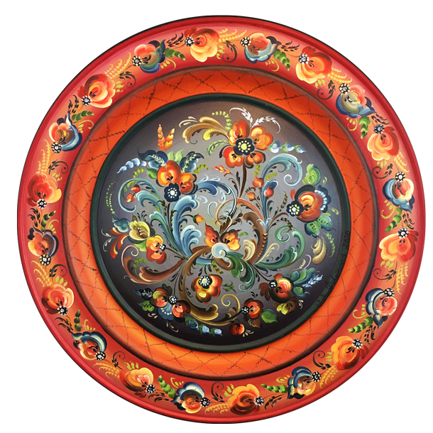 A large plate with Telemark style roses on red and grey background